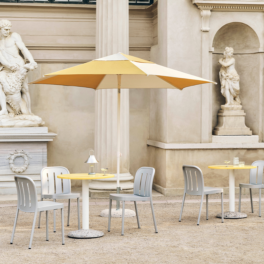 _0005_Terrazza-Parasol-Hexagon-off-white-and-ochre_Deville-Chair-silver-grey_Ceramic-Table-bright-yellow_Italian-Dessert.jpg