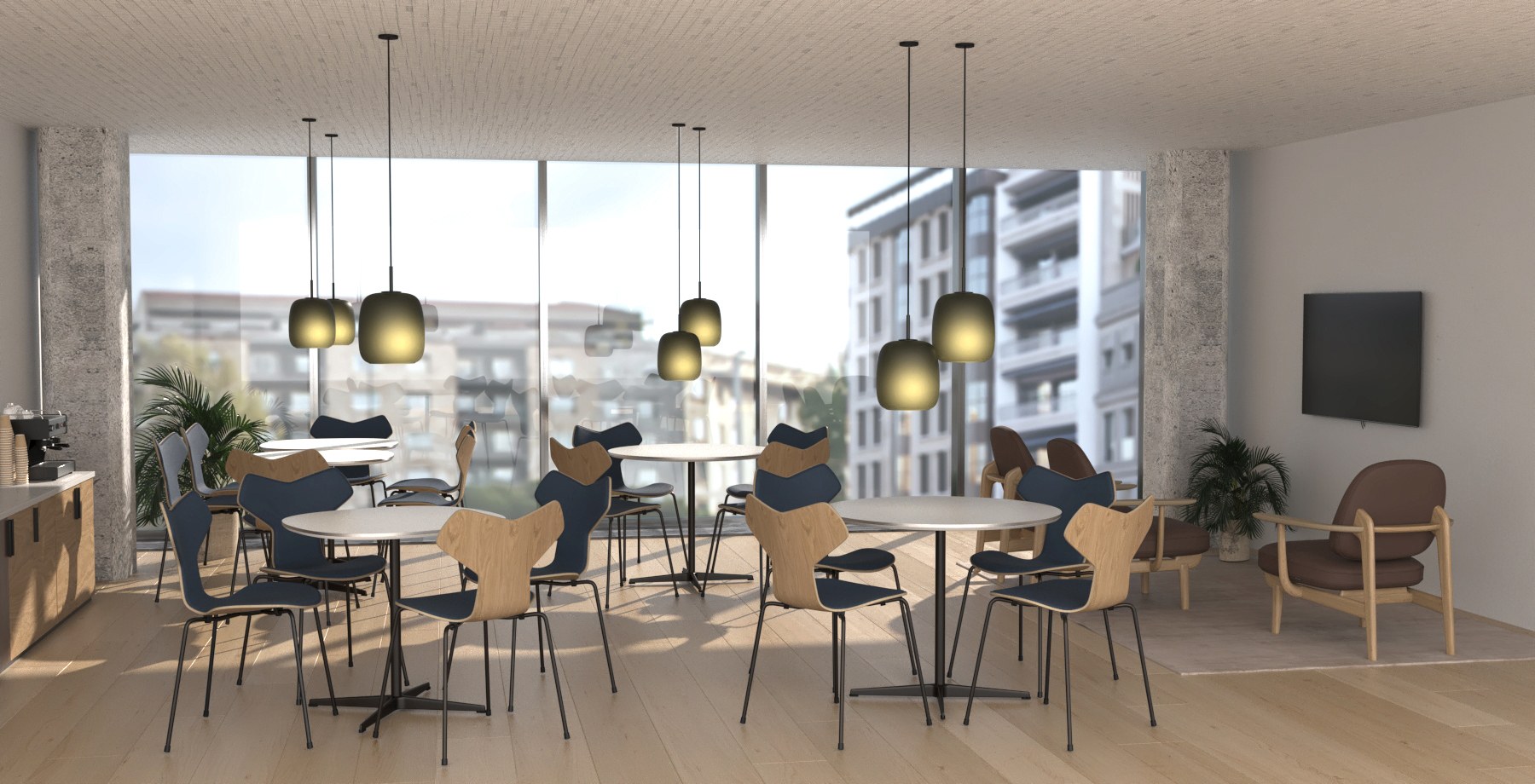 Fritz Hansen Grand Prix™ stole ved Supercircular™ borde i bistro og kantine