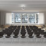 Fritz Hansen Syveren™ stole med skriveplade i konferencesal